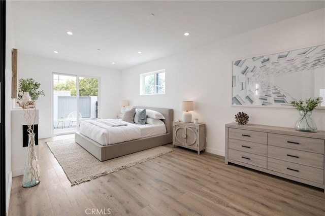 201 S Juanita Ave, Redondo Beach, CA 90277 - bedroom with access to exterior, light wood finished floors, and recessed lighting