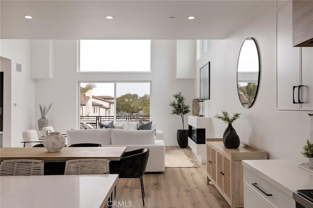 201 S Juanita Ave, Redondo Beach, CA 90277 - living area with light wood-style flooring and recessed lighting