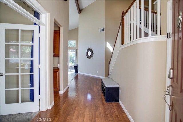 45924 Via Ln, Colorada, Temecula, CA 92592 - entryway with wood finished floors, stairs, a towering ceiling, and baseboards