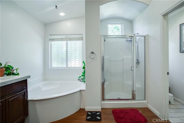 45924 Via Ln, Colorada, Temecula, CA 92592 - full bath featuring a stall shower, a bath, vanity, wood finished floors, and toilet