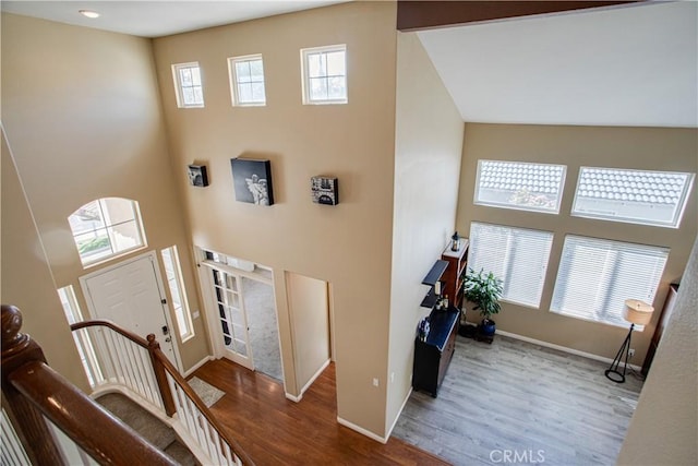 45924 Via Ln, Colorada, Temecula, CA 92592 - entryway with a high ceiling, wood finished floors, and baseboards