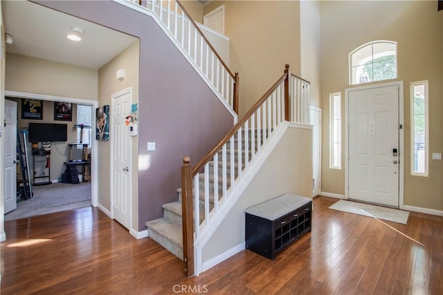 45924 Via Ln, Colorada, Temecula, CA 92592 - entryway with a towering ceiling, plenty of natural light, stairs, wood finished floors, and baseboards