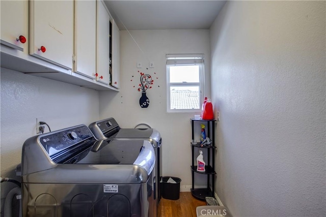 45924 Via Ln, Colorada, Temecula, CA 92592 - laundry area with washer and dryer, cabinet space, wood finished floors, and baseboards