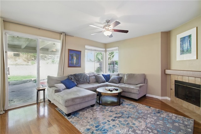 45924 Via Ln, Colorada, Temecula, CA 92592 - living room with ceiling fan, wood-type flooring, a tile fireplace, and baseboards