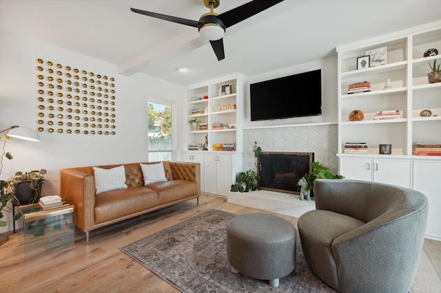 5171 College Gardens Ct, San Diego, CA 92115 - living area featuring a fireplace, ceiling fan, light wood-type flooring, and beamed ceiling