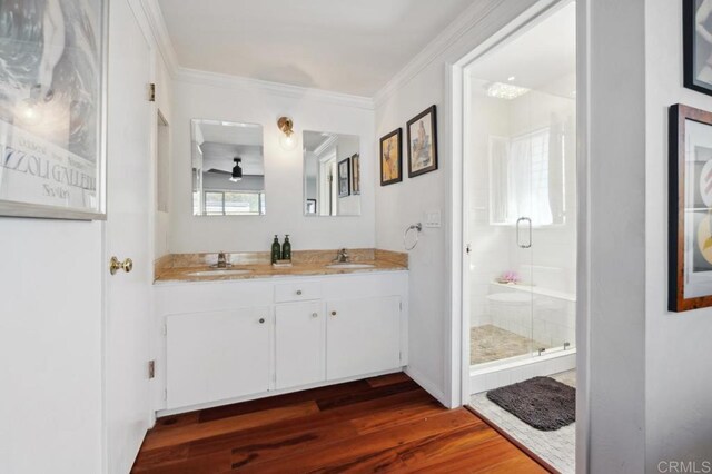 5171 College Gardens Ct, San Diego, CA 92115 - full bath featuring wood finished floors, a stall shower, double vanity, and ornamental molding