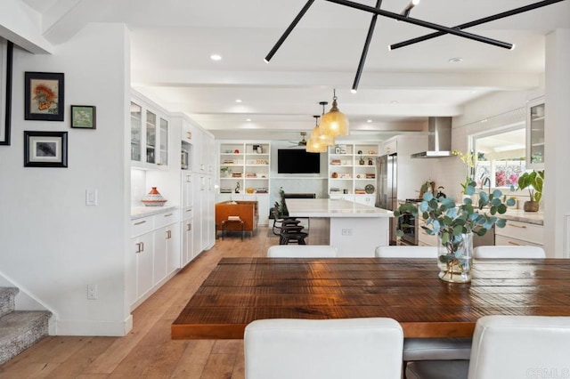 5171 College Gardens Ct, San Diego, CA 92115 - dining space with light wood-style flooring, beamed ceiling, stairs, and recessed lighting