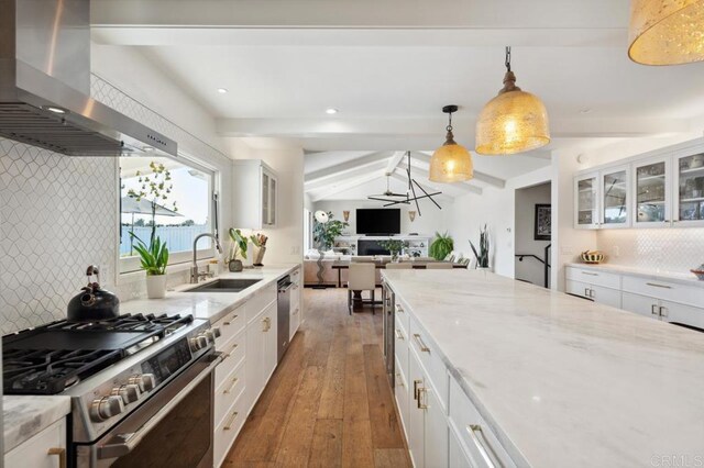 5171 College Gardens Ct, San Diego, CA 92115 - kitchen with wall chimney exhaust hood, appliances with stainless steel finishes, hardwood / wood-style floors, decorative backsplash, and recessed lighting