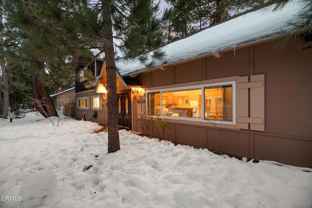 view of snow covered property