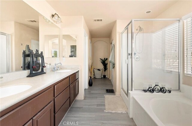 3070 Sand Pine Trl, Hemet, CA 92545 - bathroom featuring a stall shower, visible vents, and a sink