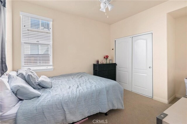 3070 Sand Pine Trl, Hemet, CA 92545 - bedroom with a closet, baseboards, and carpet