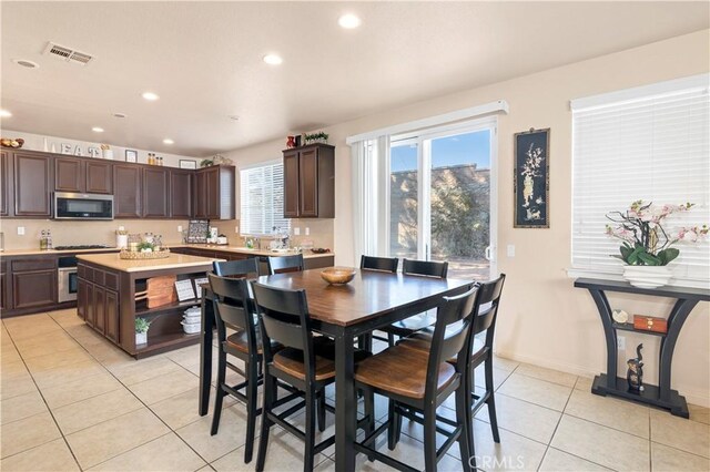 3070 Sand Pine Trl, Hemet, CA 92545 - dining room with light tile patterned floors, visible vents, baseboards, and recessed lighting