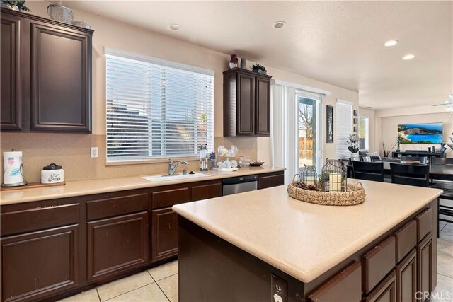 3070 Sand Pine Trl, Hemet, CA 92545 - kitchen featuring stainless steel dishwasher, dark brown cabinetry, light countertops, and a sink