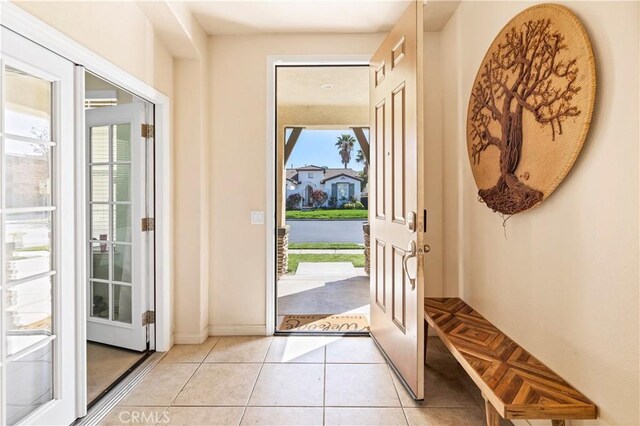 3070 Sand Pine Trl, Hemet, CA 92545 - entrance foyer featuring light tile patterned flooring and baseboards