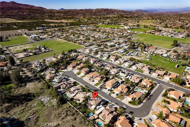 bird's eye view with a mountain view and a residential view