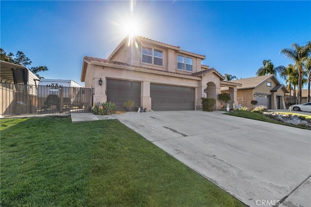 view of front of home with stucco siding, a front lawn, fence, concrete driveway, and an attached garage