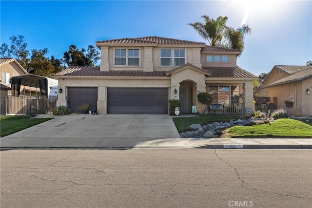 view of front of home with fence, a tile roof, stucco siding, driveway, and an attached garage