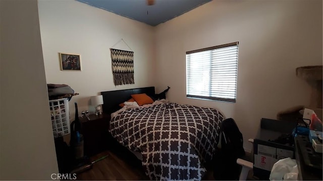 bedroom featuring wood finished floors