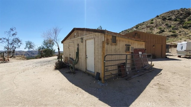 view of outdoor structure featuring an outdoor structure and a mountain view