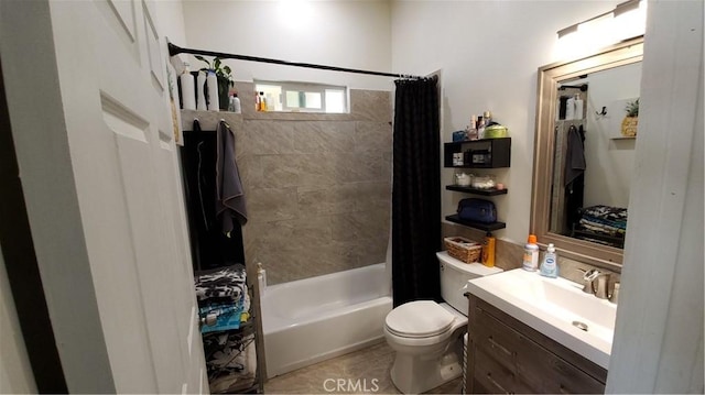 bathroom with vanity, toilet, and shower / bath combo