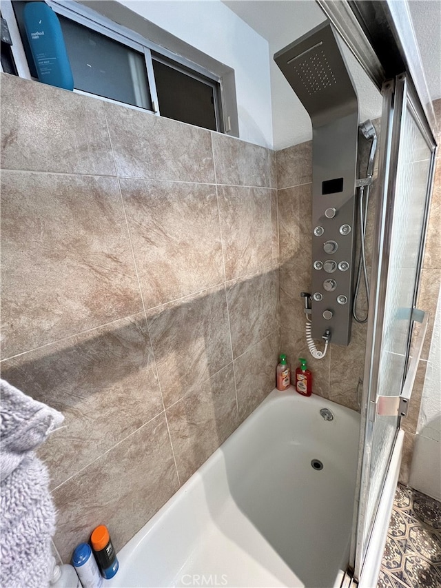 full bathroom with shower / tub combination