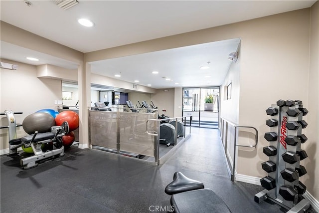 7320 Hawthorn Ave Unit 111, Los Angeles, CA 90046 - gym with baseboards and recessed lighting