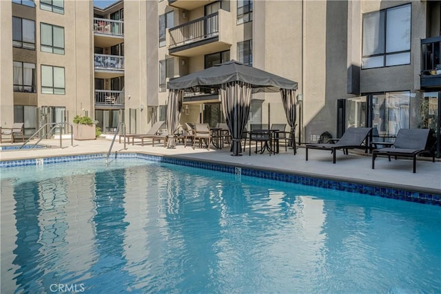 7320 Hawthorn Ave Unit 111, Los Angeles, CA 90046 - community pool featuring a gazebo and a patio
