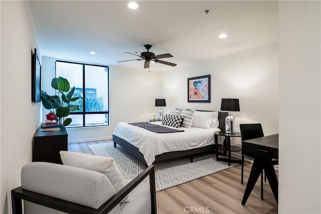 7320 Hawthorn Ave Unit 111, Los Angeles, CA 90046 - bedroom featuring wood finished floors, recessed lighting, and baseboards