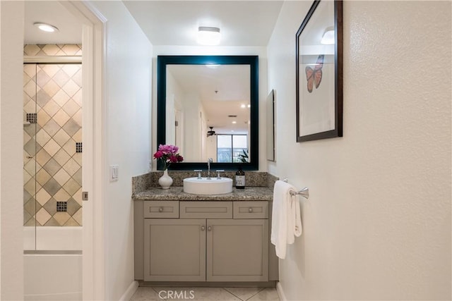 7320 Hawthorn Ave Unit 111, Los Angeles, CA 90046 - bathroom featuring vanity, baseboards, and tile patterned floors
