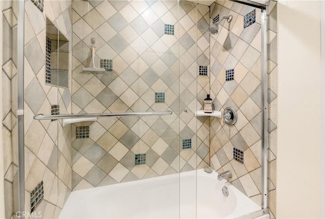 7320 Hawthorn Ave Unit 111, Los Angeles, CA 90046 - bathroom featuring combined bath / shower with glass door
