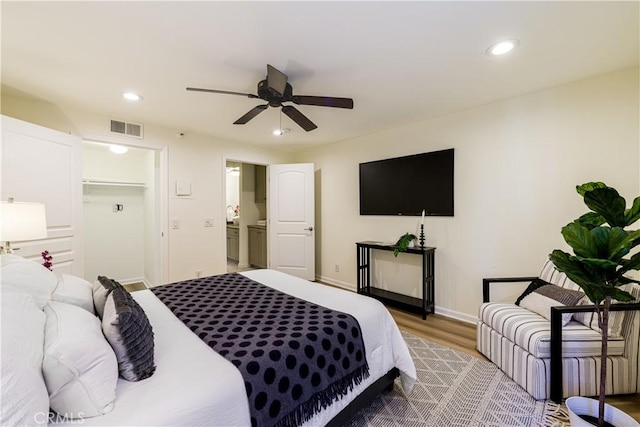 7320 Hawthorn Ave Unit 111, Los Angeles, CA 90046 - bedroom with wood finished floors, recessed lighting, baseboards, and a ceiling fan