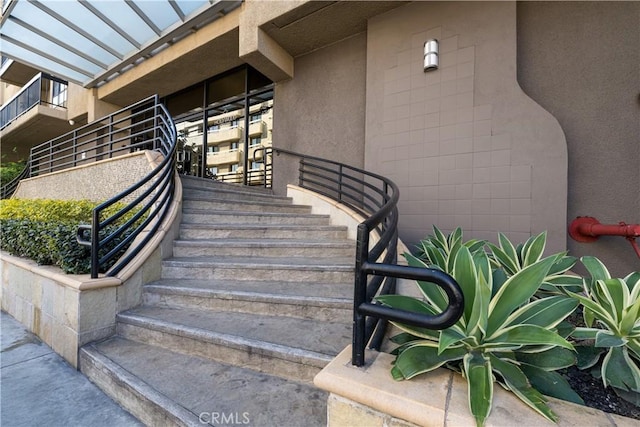 7320 Hawthorn Ave Unit 111, Los Angeles, CA 90046 - doorway to property with stucco siding