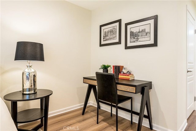 7320 Hawthorn Ave Unit 111, Los Angeles, CA 90046 - office area with wood finished floors and baseboards