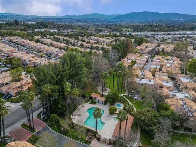 drone / aerial view featuring a mountain view and a residential view