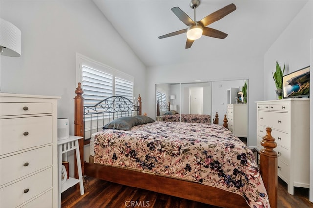bedroom featuring dark wood-type flooring, a ceiling fan, and vaulted ceiling