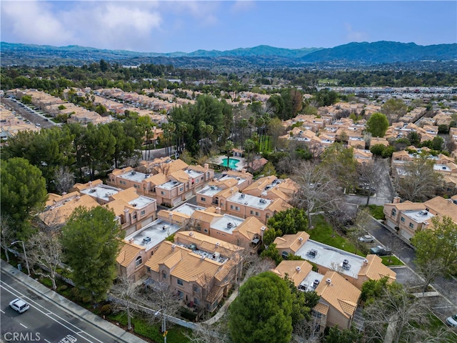 bird's eye view featuring a residential view and a mountain view