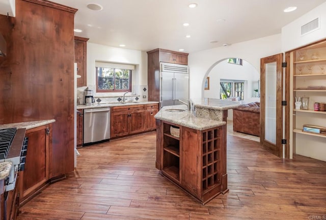 112 La Veta Ave, Encinitas, CA 92024 - kitchen with visible vents, wood-type flooring, appliances with stainless steel finishes, and a wealth of natural light