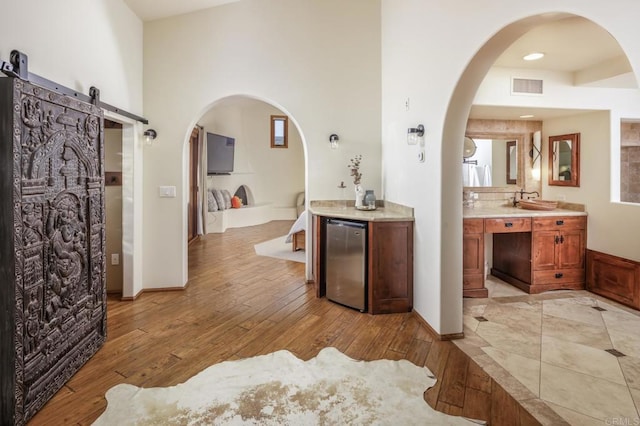 112 La Veta Ave, Encinitas, CA 92024 - full bathroom with visible vents, hardwood / wood-style floors, and vanity