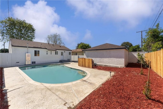 view of swimming pool with a patio area, a fenced backyard, and a fenced in pool