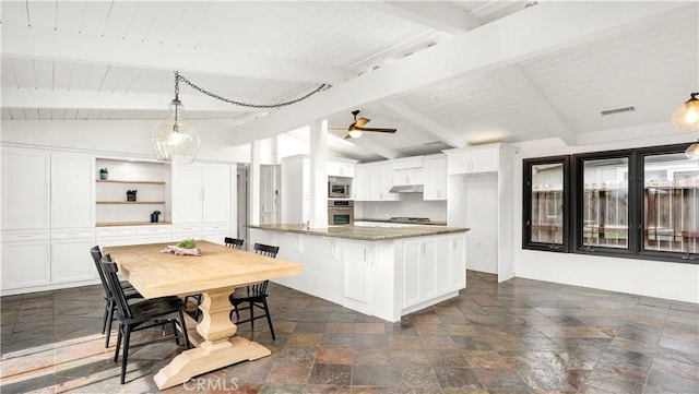 3317 Lees Ave, Long Beach, CA 90808 - kitchen featuring stainless steel appliances, dark stone finish floors, white cabinets, pendant lighting, and ceiling fan