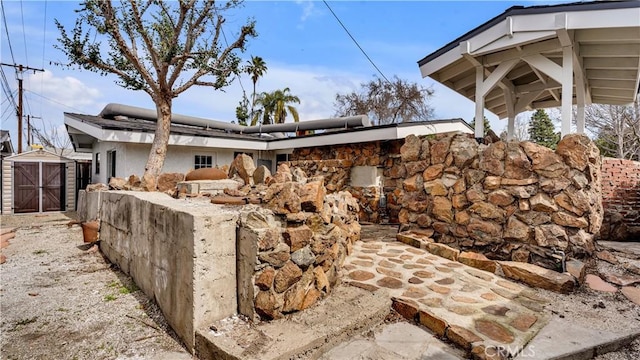 3317 Lees Ave, Long Beach, CA 90808 - view of side of property with a storage shed and an outbuilding