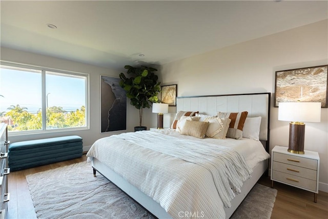 bedroom featuring wood finished floors
