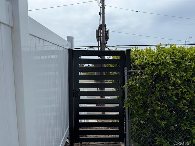 details featuring a gate and fence