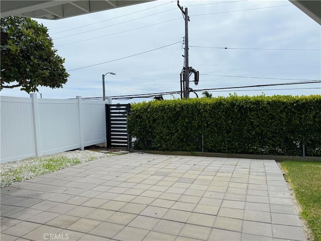 view of patio with fence