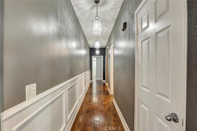 1610 Via Roma Cir, Corona, CA 92881 - hallway featuring dark wood-type flooring and baseboards