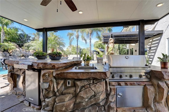 1610 Via Roma Cir, Corona, CA 92881 - view of patio with outdoor wet bar, a ceiling fan, a sink, grilling area, and area for grilling