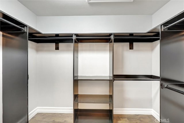 1610 Via Roma Cir, Corona, CA 92881 - spacious closet featuring wood finished floors