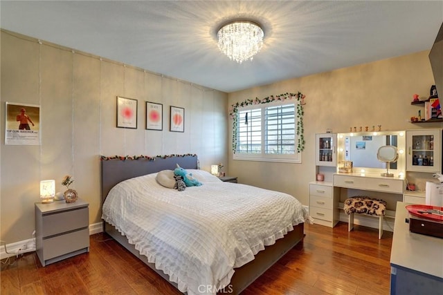 1610 Via Roma Cir, Corona, CA 92881 - bedroom featuring hardwood / wood-style floors and a chandelier