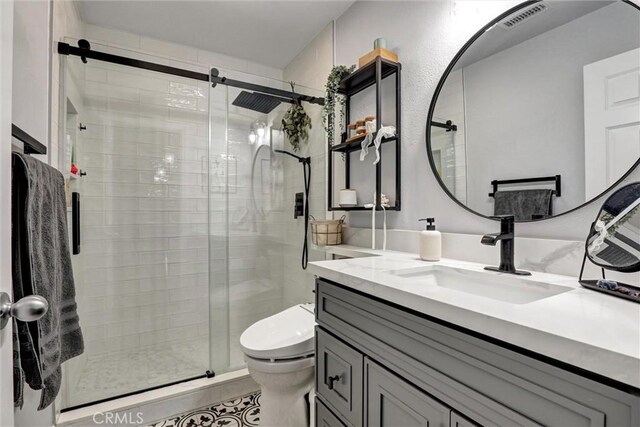 1610 Via Roma Cir, Corona, CA 92881 - full bath with toilet, visible vents, vanity, and a stall shower