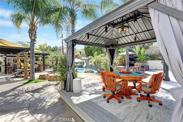 1610 Via Roma Cir, Corona, CA 92881 - wooden terrace with a gazebo, a patio area, an outdoor pool, outdoor dining area, and fence
